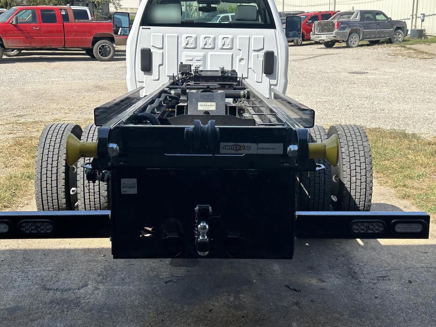 Rear view of a completed hook-lift bed installation